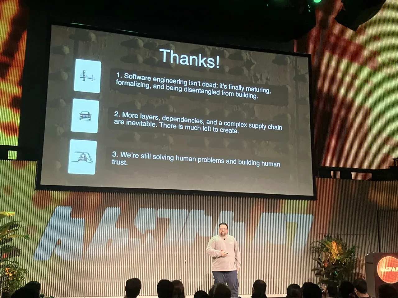Jamie Turner's final slide listing three conclusions about software engineering, supply chains, and human trust